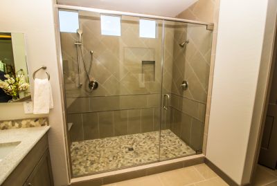 Walk-in Shower Featuring Natural Stone Walls